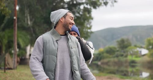 Happy Couple Piggyback Ride in Nature