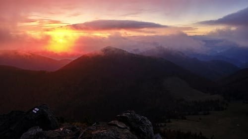 Sunrise in the Mountains Clouds Spill Over the Peaks of Hills in the Carpathian Mountainstimelapse