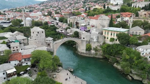 Mostar old bridge Bosnia and Herzegovina panning drone aerial view