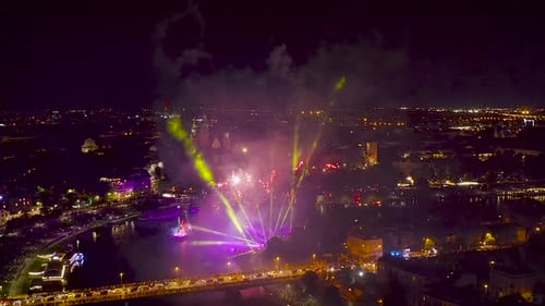 Fireworks over Wawel Royal Castle and Vistula river in Krakow during Dragon Parade, Poland.