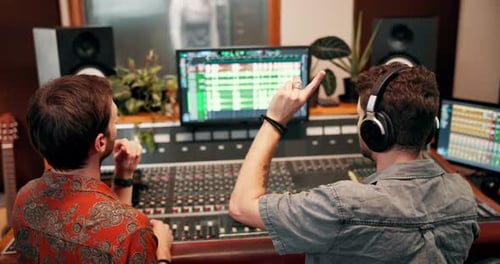 Men, partner and count down in recording studio for sound or song mixing as music producer