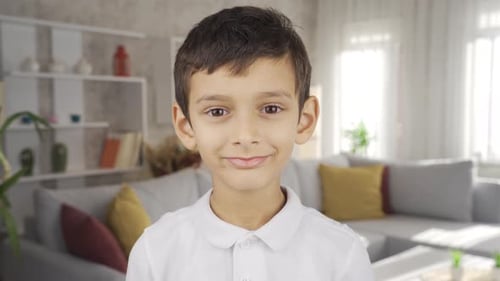 Boy looking at camera.