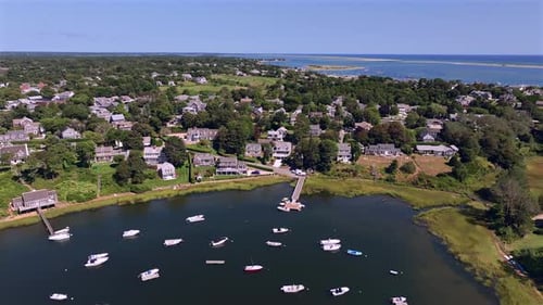Aerial view of boats in harbor and small town. Chatham, Cape Cod, USA.