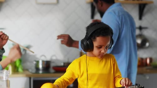 Cute Adorable Little Child Playing DJ Using Hardware Electronic Sound Mahcine Performing Song for