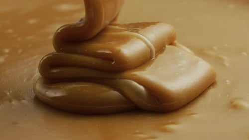Closeup of Melted Caramel Pouring In