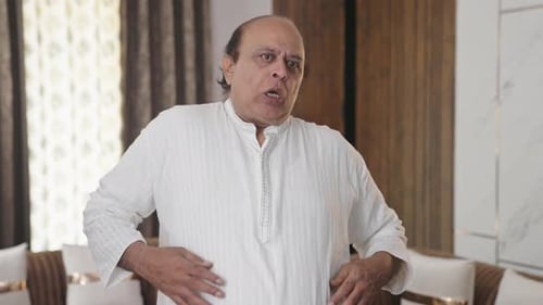 Indian old man having gastric problem