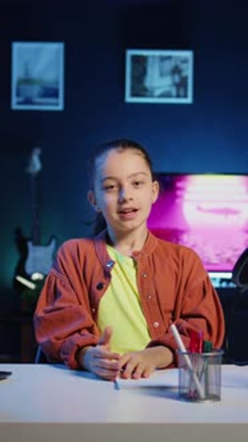 Young Child Filming Video for Her Newly Opened Online Channel Presenting Herself to Audiences