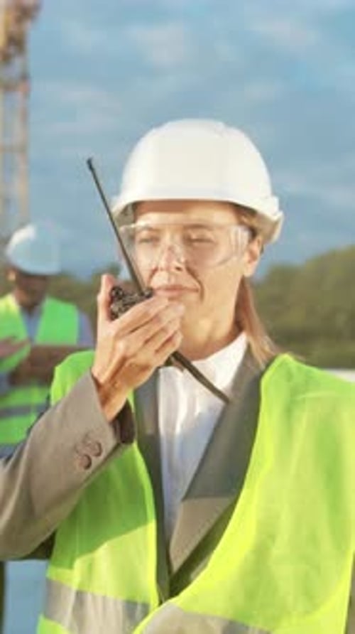Foreman Relays Instructions Clearly Project Manager Engages Team with Radio Communication During