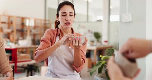 Woman, teaching and molding clay for pottery with sculpture design, learning technique