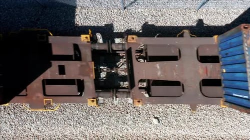 Aerial View of Train Transporting Freight Containers