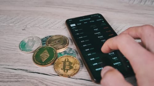 List of Cryptocurrencies on the Smartphone Screen in the Mobile Exchange App