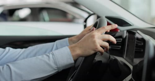 Close Up Young Man Auto Driver Car Owner Holding Steering Wheel Buy New Automobile Dealership Inside
