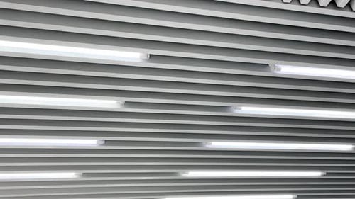 Abstract Gray and White Ceiling with Fluorescent Lights