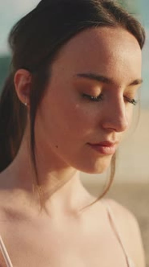 Woman Close Up Portrait on Sunny Beach