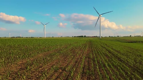 Electricity From Wind Wind Generator Operation Wind Turbine in Motion on Rural Farmland