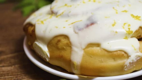 Frosted Cinnamon Rolls with Lemon Zest Close Up