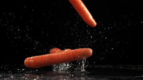 Falling Carrots on the tableFilmed is Slow Motion 1000 Fps