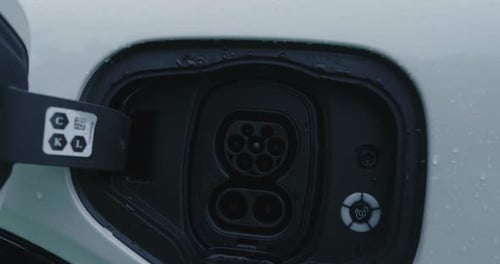 Socket For Charging on Electric Car, Close Up Revealing Pull Back