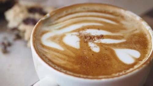 Coffee Art Displayed in a Cozy Cafe Setting