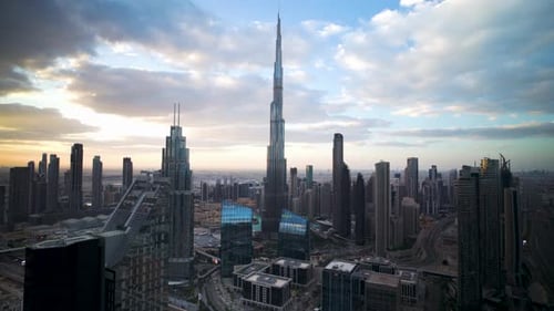 Timelapse of modern city center with tall skyscrapers in Dubai city center.