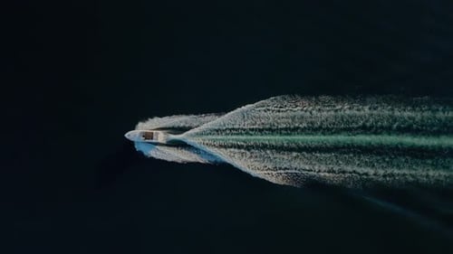 Top View Luxurious Yacht Cruising Through Open Waters Aerial View