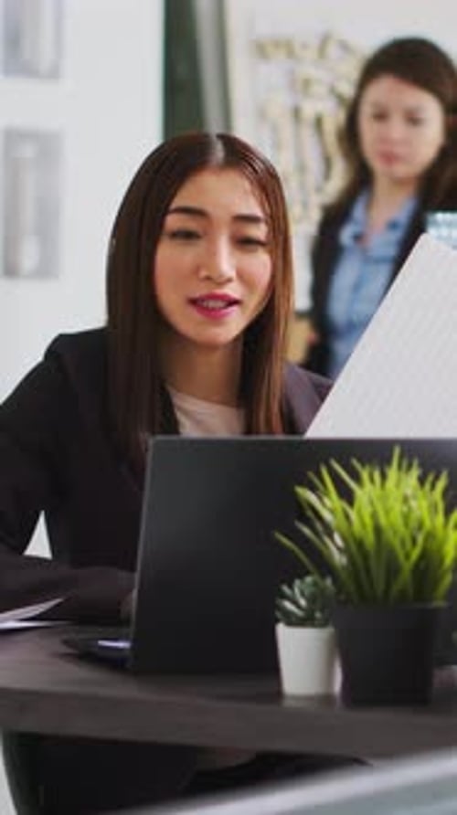 Vertical Video Developer on Videocall with Specialist to Confirm Proper Features