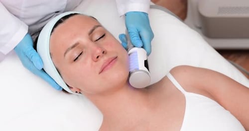 Woman Receiving a Skincare Treatment at Clinic