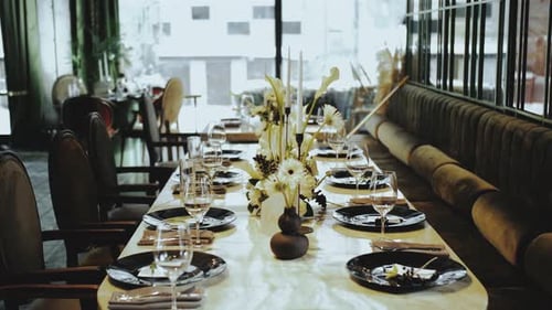 Elegant Restaurant Wedding Table Setting With Flowers