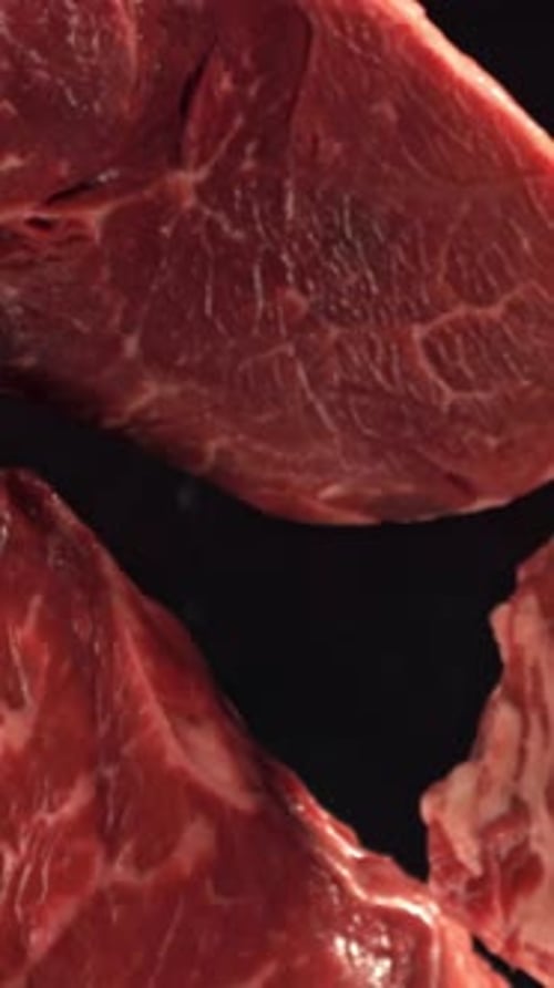 Beef Ribeye Steak Fly Up and Falls Down Filmed on a Highspeed Camera at 1000 Fps