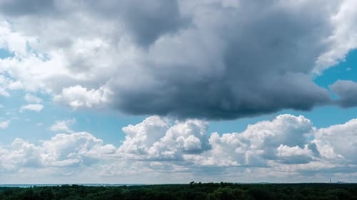 Clouds Time Lapse Over Green Forest