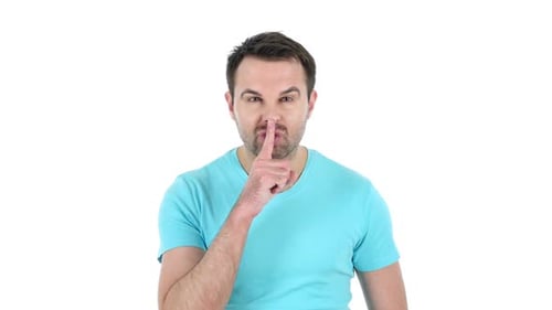 Silence Finger on Lips of Middle Aged Man