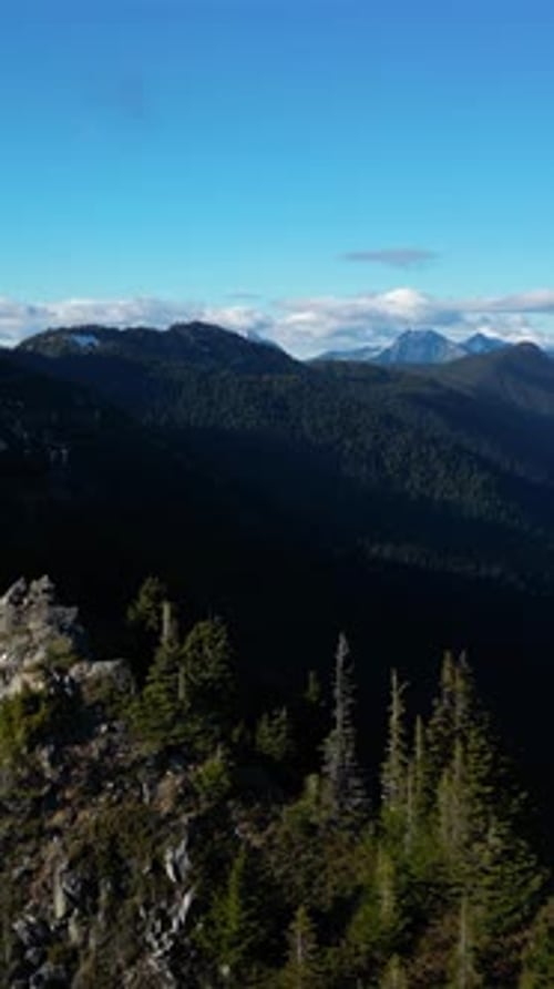 Majestic Mountain Peaks and Evergreen Forest. British Columbia, Canada.