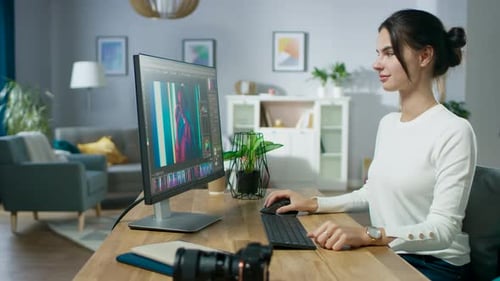 Professional Female Photographer Works in Photo Editing App / Software on His Personal Computer. Ph