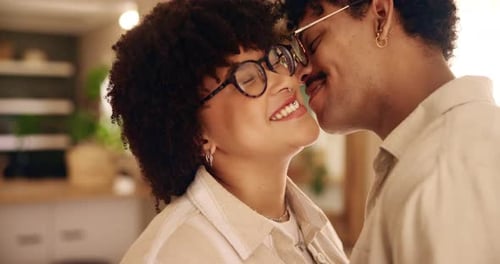 Affectionate Young Couple Embracing at Home