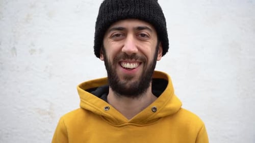 Portrait Of An Individual While Laughing And Looking Directly At The Camera. Close-up