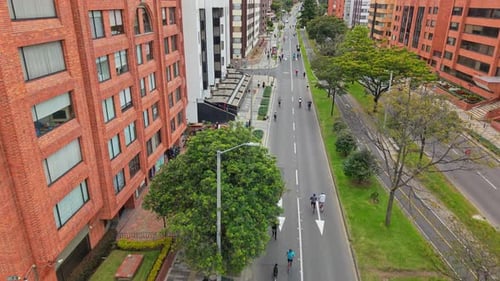 Aerial View of Cyclists in Bogota's Ciclovía, Traffic-Free Urban Streets