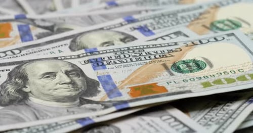 American dollar, 100 dollar bills counted on the table.Close up of the American money.