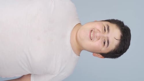 Young Adult Talking in Close-Up, Vertical Format