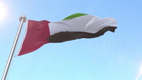 Realistic Waving United Arab Emirates Flag against Blue Sky