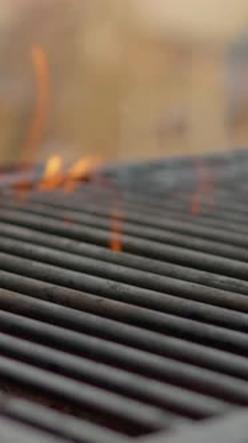 Vertical Screen Empty grill heating up, preparing for cooking
