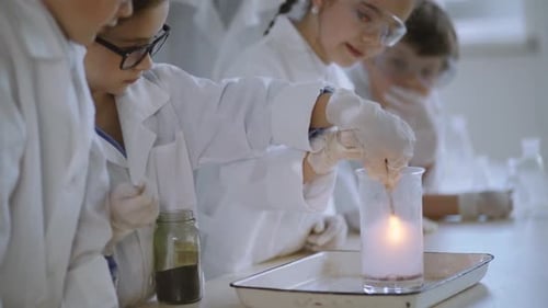 Children Conducting a Science Experiment in Lab
