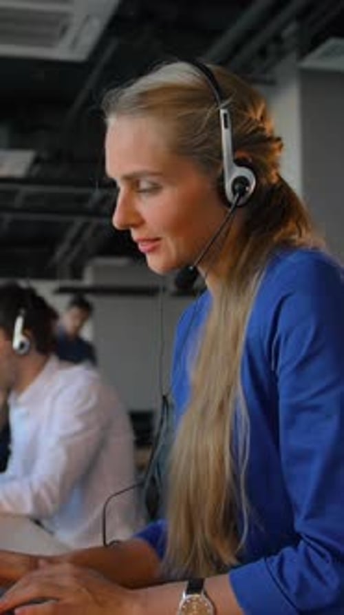 Professional Woman Working on Laptop in Office