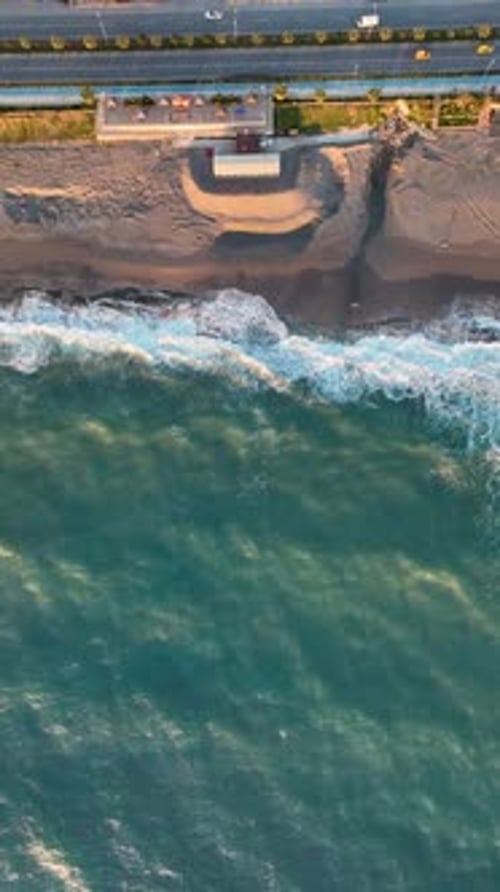 Vertical Video Serene SlowMotion Sea Waves with Azure Sky