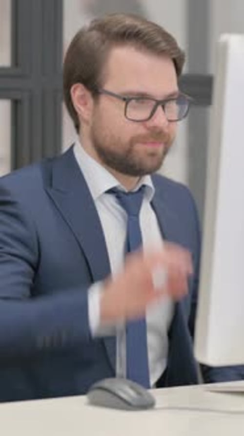Professional Man in Suit Working at Computer
