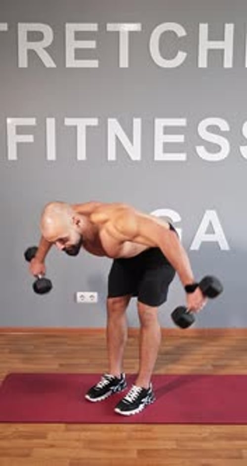 Man Doing Dumbbell Row Exercise