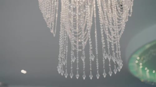 Elegant Crystal Chandelier Hanging from Ceiling