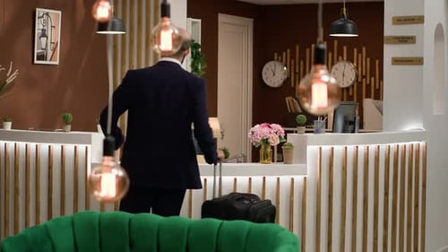 Businessman Calling for Hotel Concierge