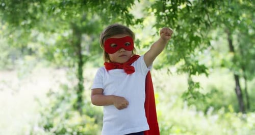 Girl Dressed as Superhero in Green Park