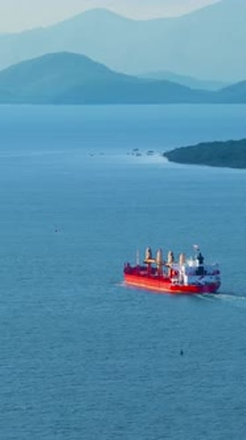 Cargo Ship Sailing on Open Sea – Commercial Cargo Ship Maritime Transport
