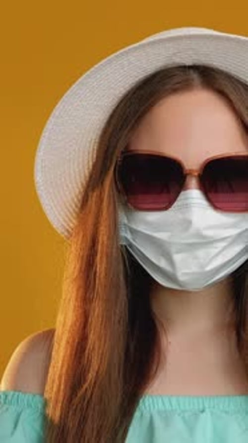 Woman with mask and passport